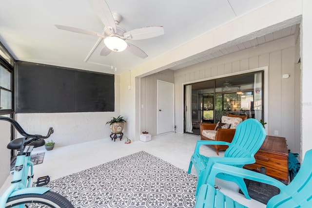 interior space featuring ceiling fan