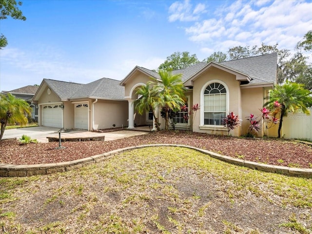 ranch-style house featuring a garage