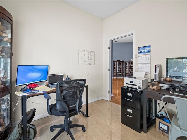 office area featuring light hardwood / wood-style floors