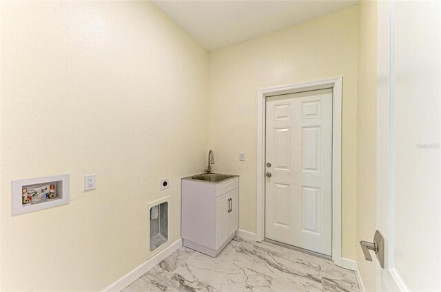 laundry room with hookup for a washing machine, cabinets, sink, and electric dryer hookup