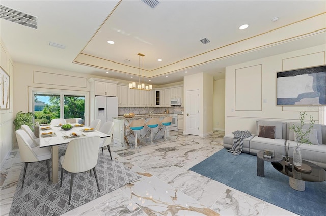 dining space featuring sink