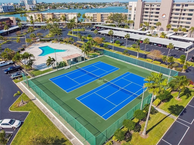 birds eye view of property featuring a water view