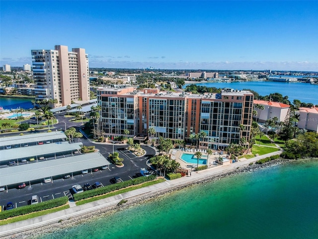 birds eye view of property featuring a water view