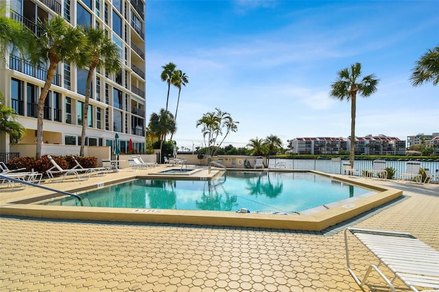 view of swimming pool with a patio area