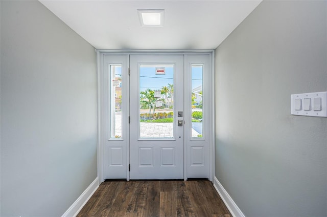 doorway to outside with dark hardwood / wood-style floors