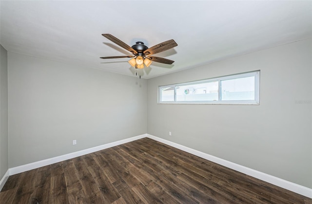 unfurnished room with dark hardwood / wood-style floors and ceiling fan