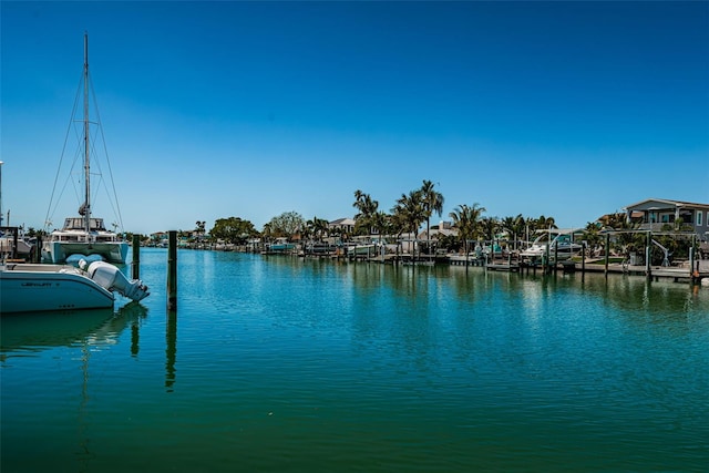 property view of water featuring a boat dock