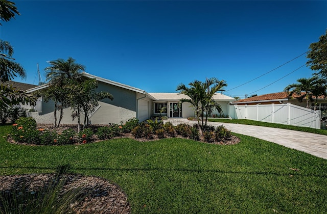 ranch-style house with a front yard