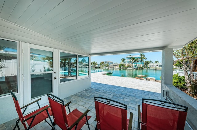 view of patio / terrace with a water view