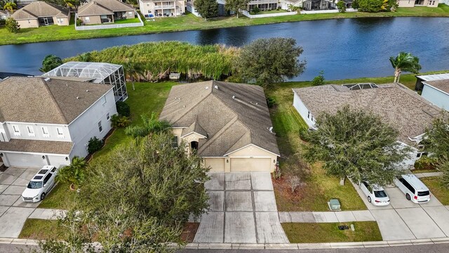 birds eye view of property featuring a water view