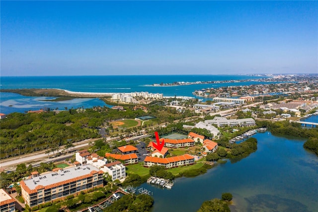 birds eye view of property with a water view