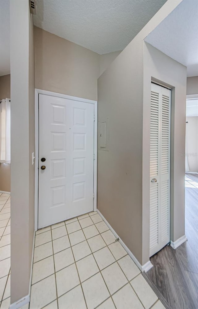 view of tiled foyer entrance