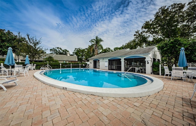 view of pool with a patio area