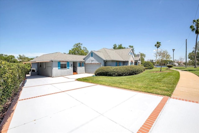 ranch-style house with a front lawn and a garage