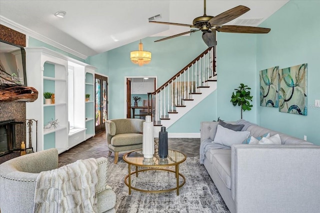 living room with high vaulted ceiling, a fireplace, dark parquet flooring, and ceiling fan