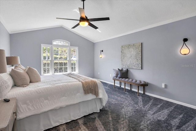 bedroom with ceiling fan, carpet flooring, and vaulted ceiling