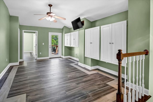 entryway featuring vaulted ceiling, dark hardwood / wood-style floors, and ceiling fan