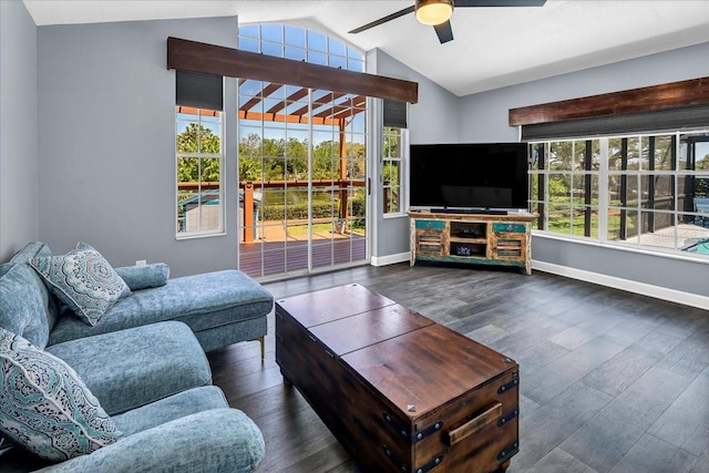 living room with lofted ceiling, a healthy amount of sunlight, ceiling fan, and dark hardwood / wood-style flooring