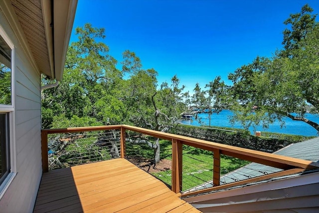 deck featuring a water view