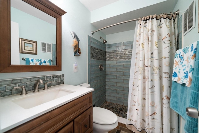 bathroom featuring backsplash, curtained shower, toilet, and vanity