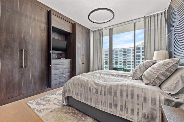 bedroom with wood-type flooring