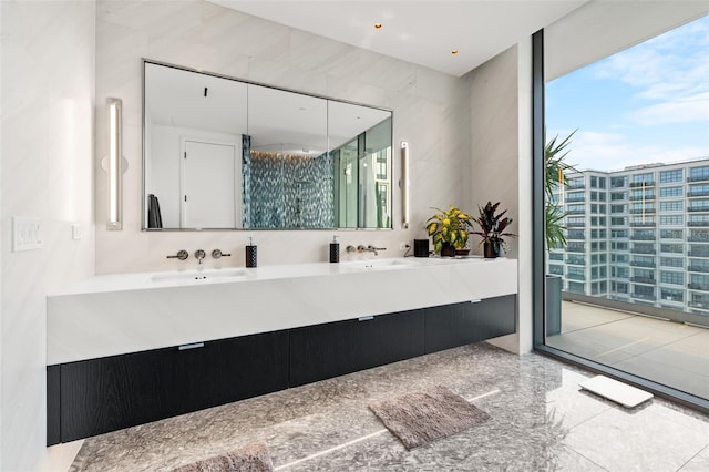 bathroom featuring tile flooring, double vanity, and tasteful backsplash