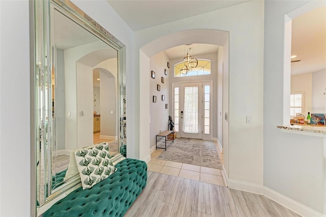 foyer entrance featuring light tile floors