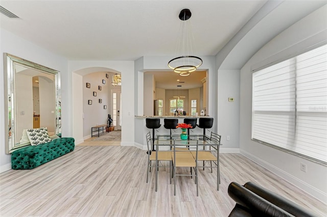 dining space featuring light hardwood / wood-style flooring