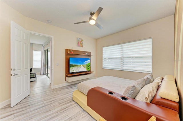 bedroom featuring light hardwood / wood-style flooring and ceiling fan