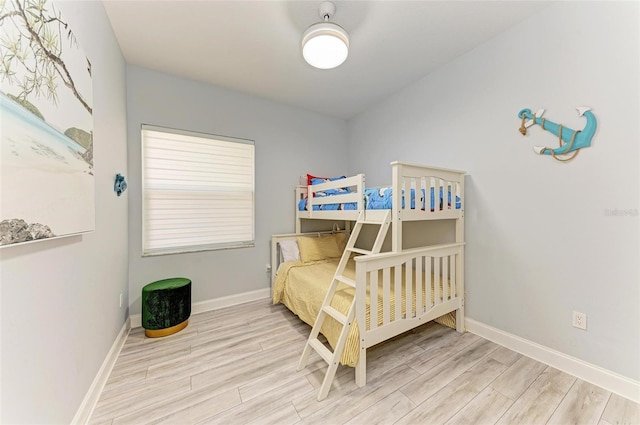 bedroom featuring light wood-type flooring