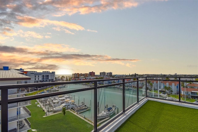 balcony with a city view and a water view