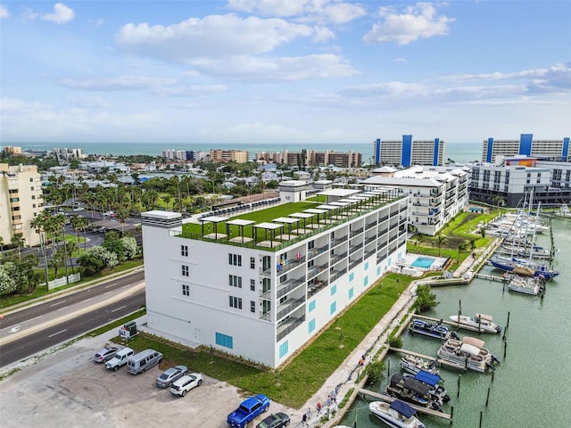 aerial view featuring a view of city and a water view