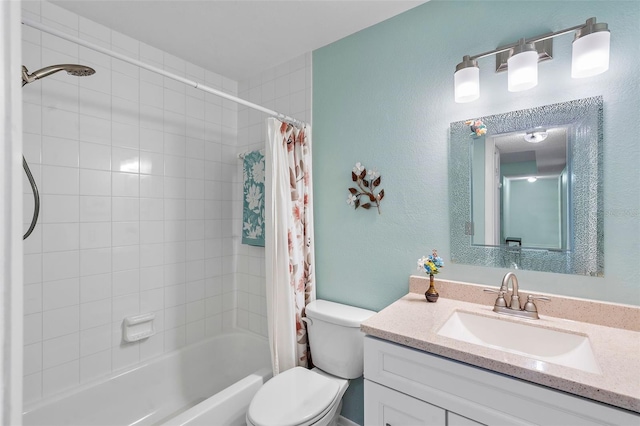 full bathroom featuring vanity, toilet, and shower / bath combination with curtain