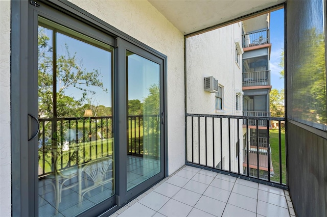 balcony featuring a wall unit AC