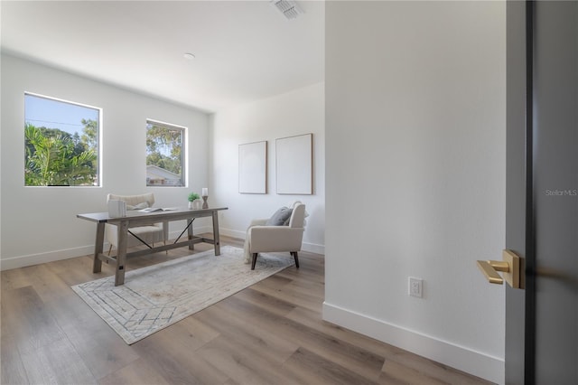 office area with light wood-type flooring