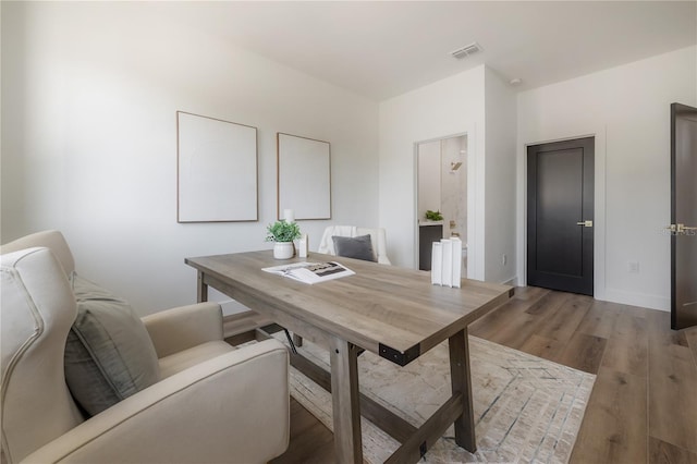 home office featuring light hardwood / wood-style flooring