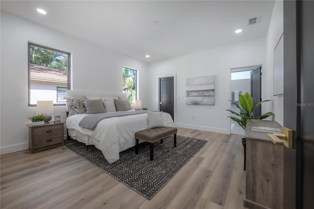 bedroom with light wood-type flooring