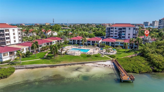 birds eye view of property featuring a water view