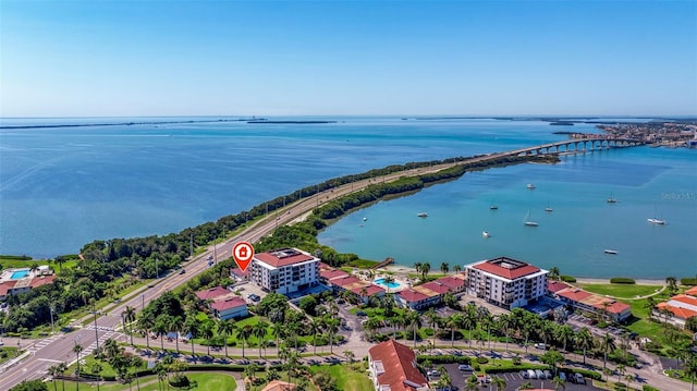 birds eye view of property featuring a water view