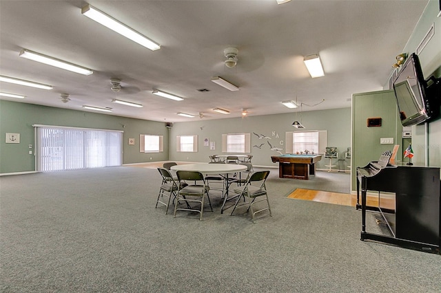 view of carpeted dining space