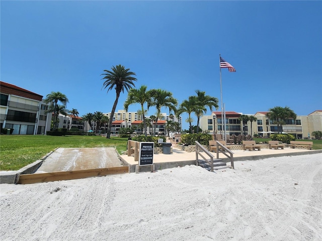 view of community featuring a yard