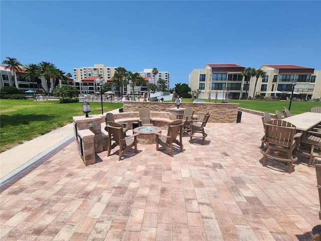 view of patio / terrace featuring a fire pit