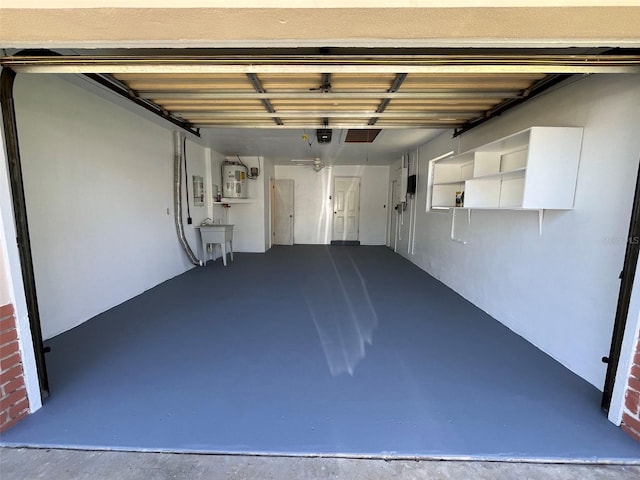 garage with sink and water heater