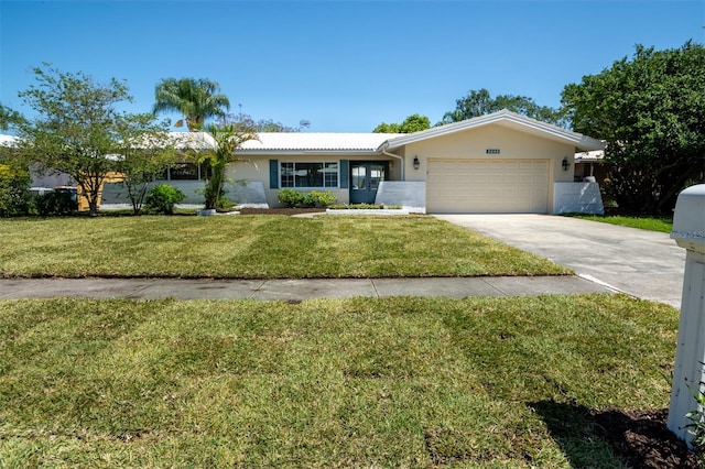 ranch-style house with a garage and a front yard