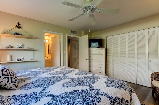 bedroom with dark hardwood / wood-style flooring, ceiling fan, and ensuite bathroom