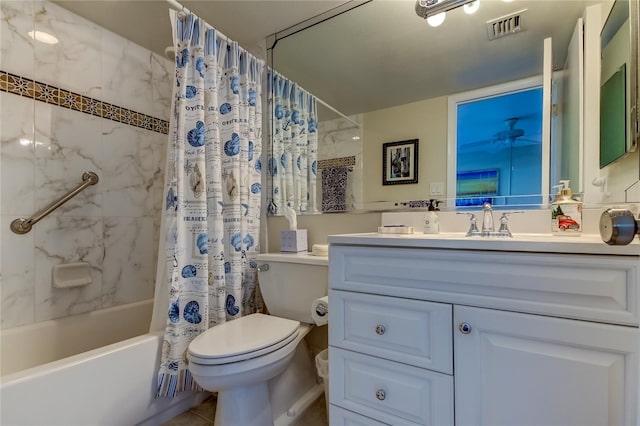 full bathroom featuring tile floors, shower / bath combo, vanity with extensive cabinet space, and toilet