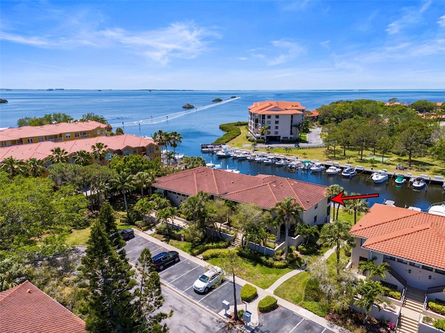 birds eye view of property featuring a water view