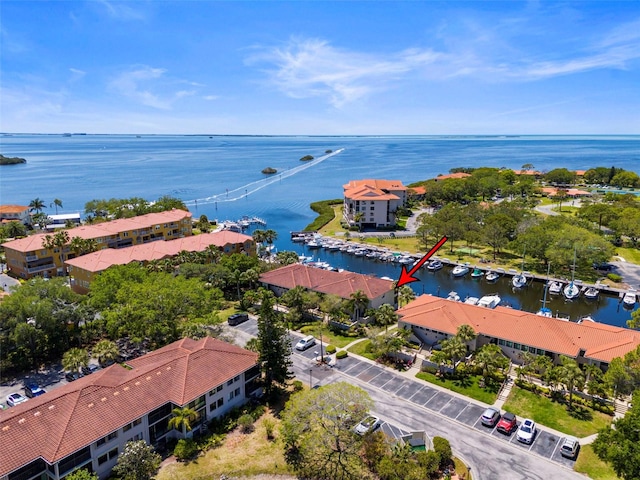 drone / aerial view with a water view