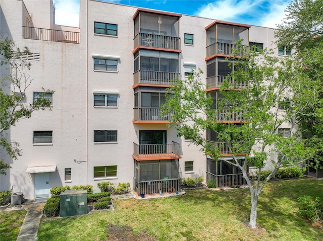 view of property featuring central AC unit