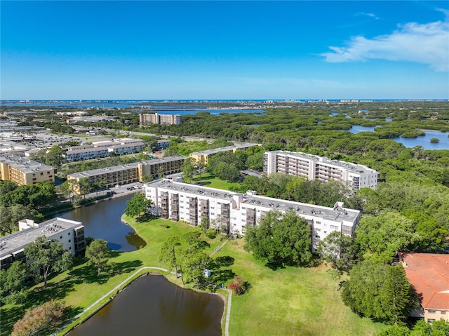 birds eye view of property featuring a water view